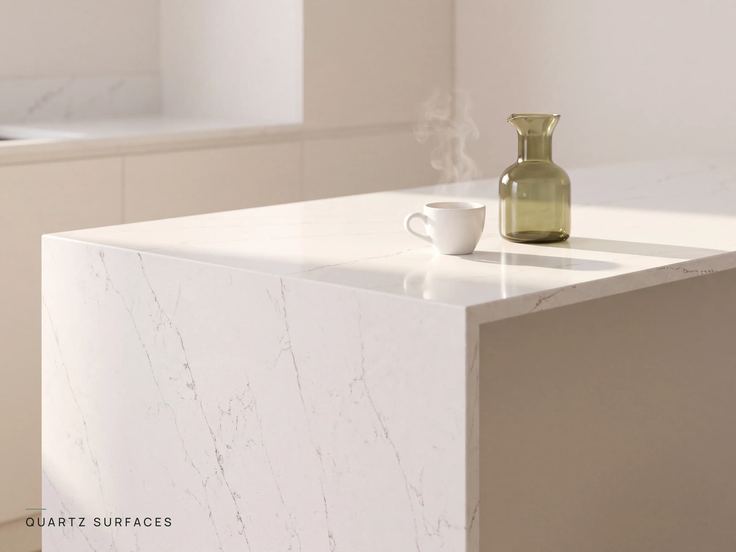 White engineered quartz island with fine grey veining, morning espresso and a green glass carafe in a minimal kitchen
